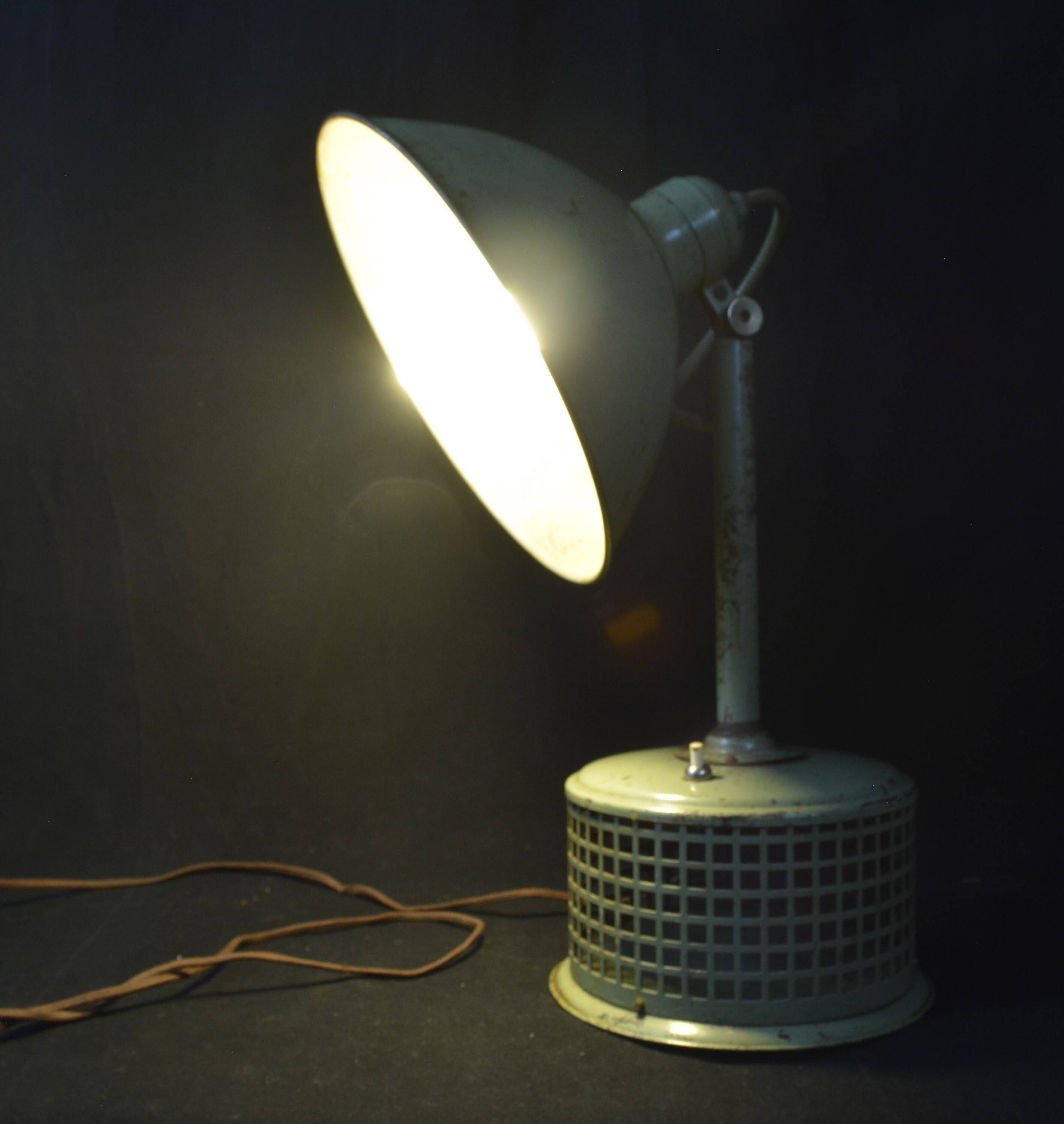 Industrial metal parabola lamp.