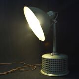Industrial metal parabola lamp.