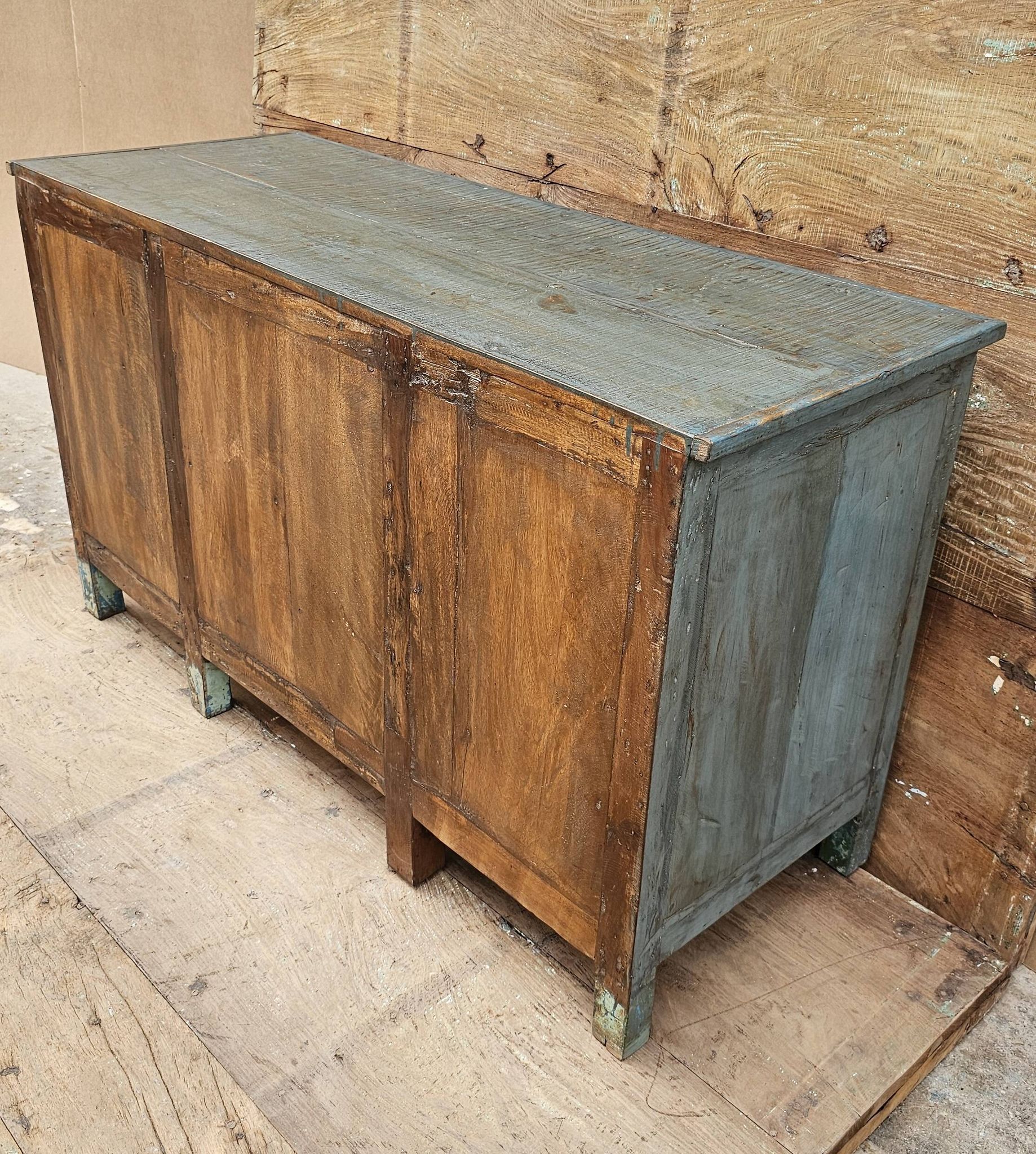 Antique glass-fronted buffet in Burmese teak