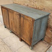 Antique glass-fronted buffet in Burmese teak
