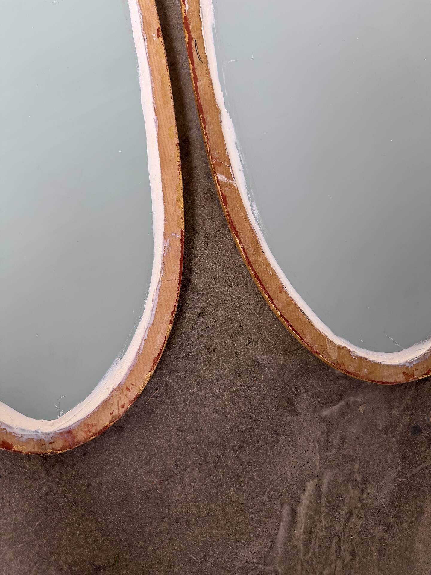 Pair of oval mirrors 1900 gilded stucco