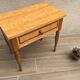 Formica and vintage wood bedside table
