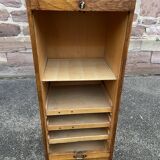 Sliding curtain binder cabinet
