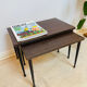 Pair of vintage nesting tables in formica, 1970.