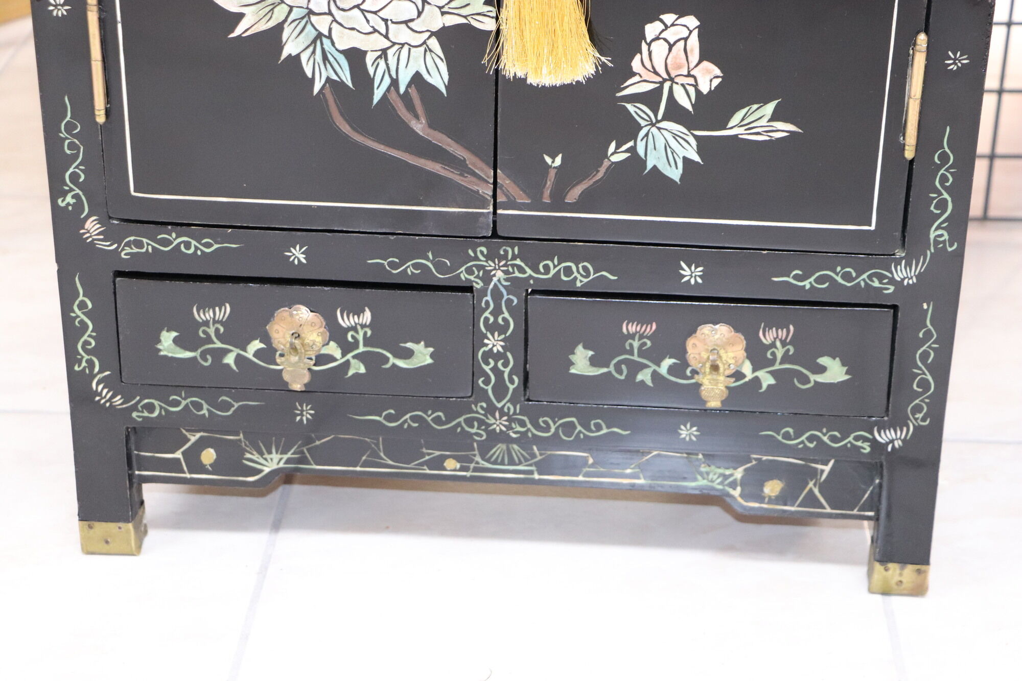 Small storage cabinet or bedside table lacquered black incised and painted