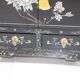 Small storage cabinet or bedside table lacquered black incised and painted