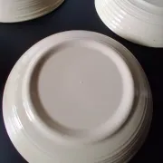 6 beige ceramic deep plates in very good condition.