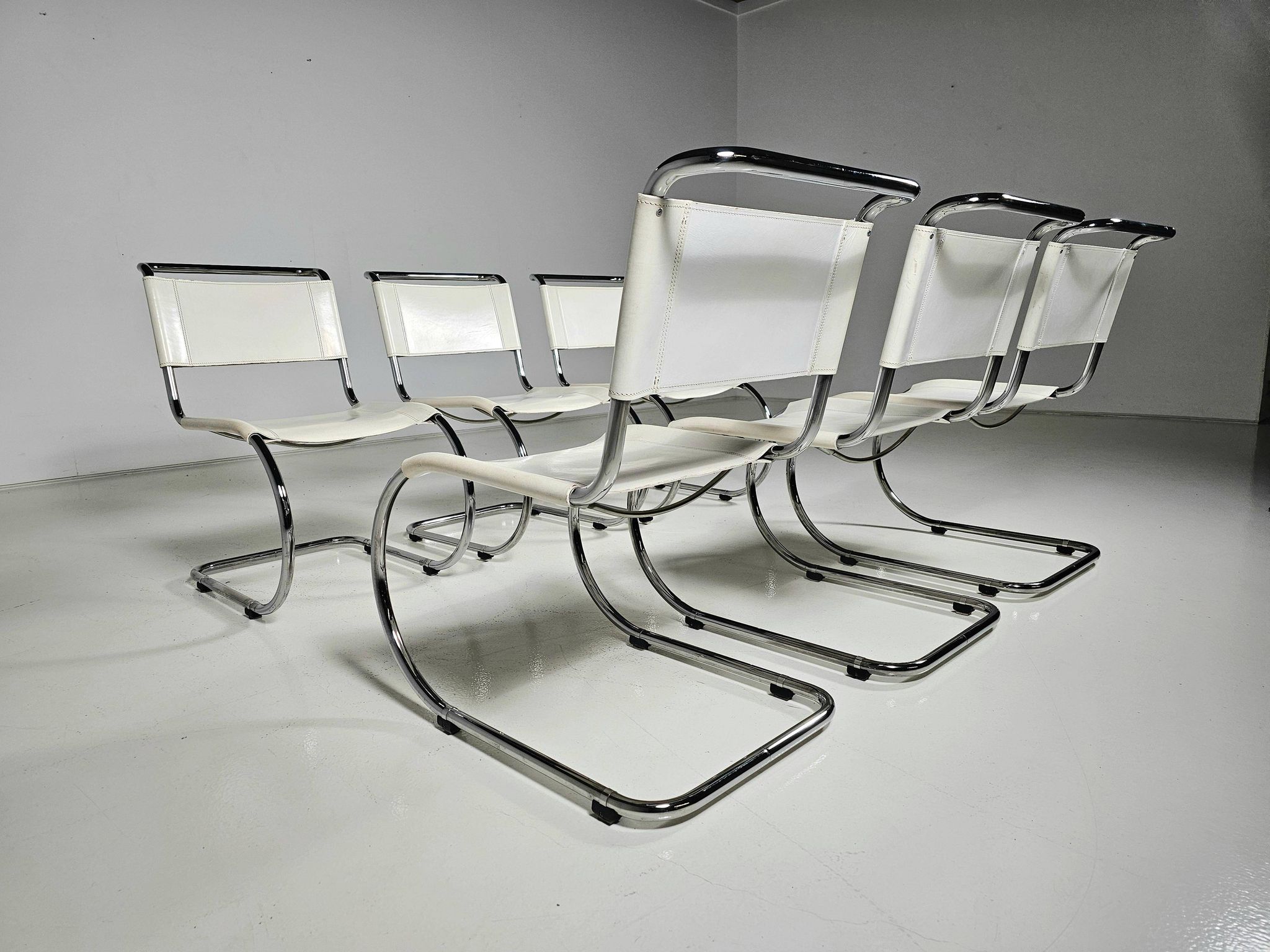 Set of 6 white cantilever dining chairs MR10 by Mies van der Rohe for Thonet, 1980s.