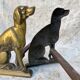 Paire de chenets chiens en laiton