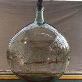 Former green glass demijohn