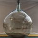 Former green glass demijohn
