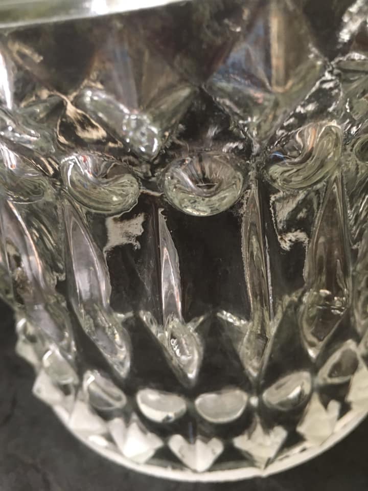 Antique globe in transparent white glass worked