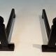Pair of Minimalist Modernist Wrought Iron Chenets with Torch Holders in Nut Design