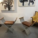 Pair of curule chairs designed by John Vesey, 1958, USA, brushed aluminum, walnut and leather