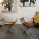 Pair of curule chairs designed by John Vesey, 1958, USA, brushed aluminum, walnut and leather