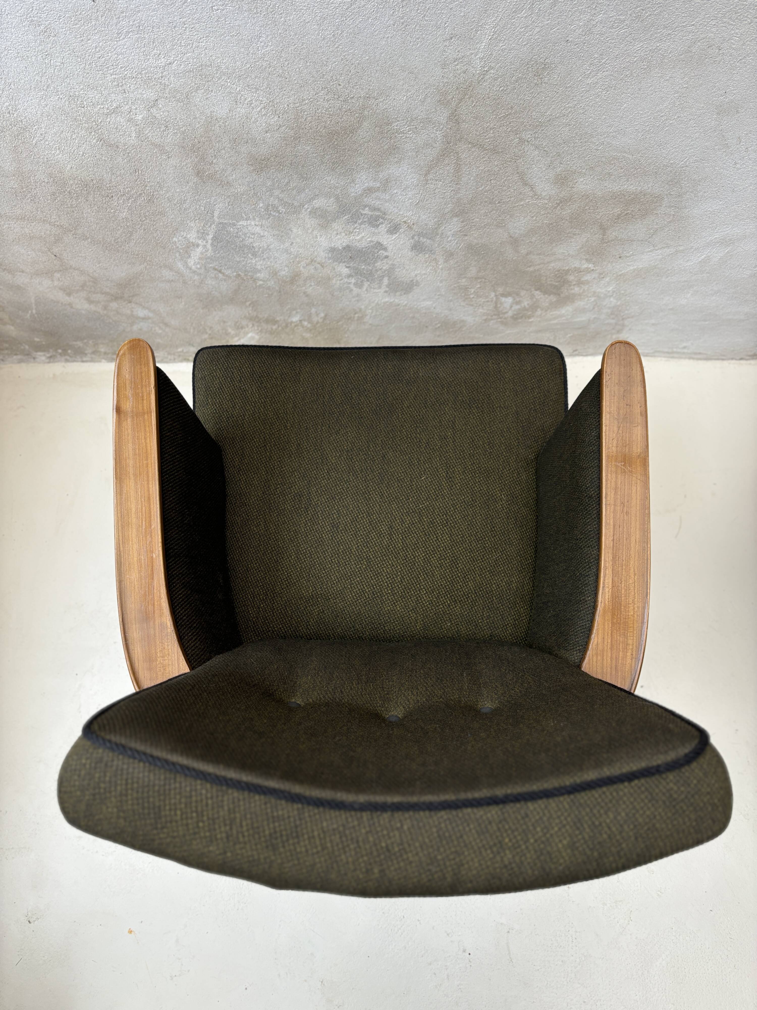 Pair of vintage wooden and fabric armchairs from the 1960s.
