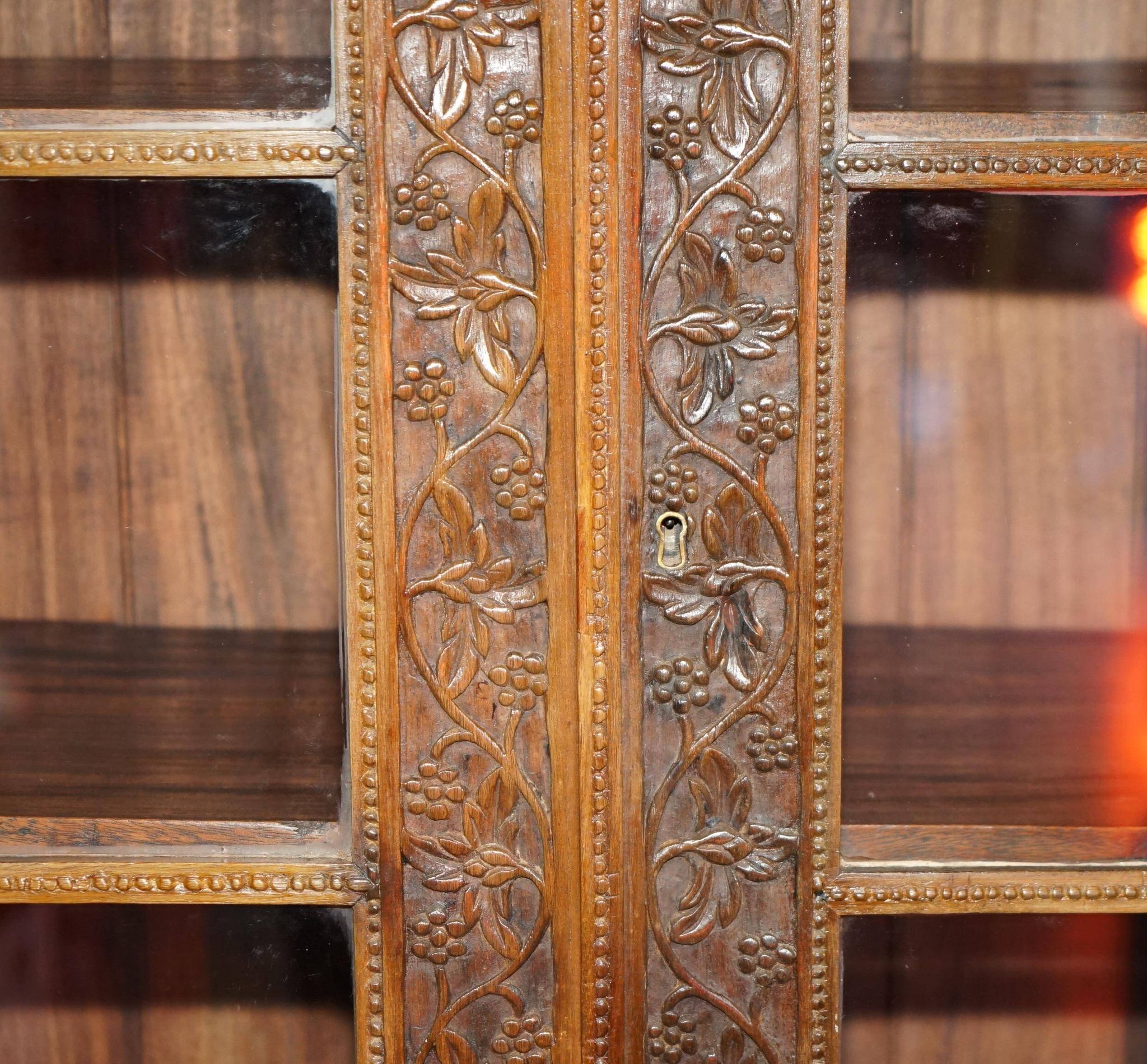 19th-century Anglo-Indian colonial hardwood library on a chest of drawers.