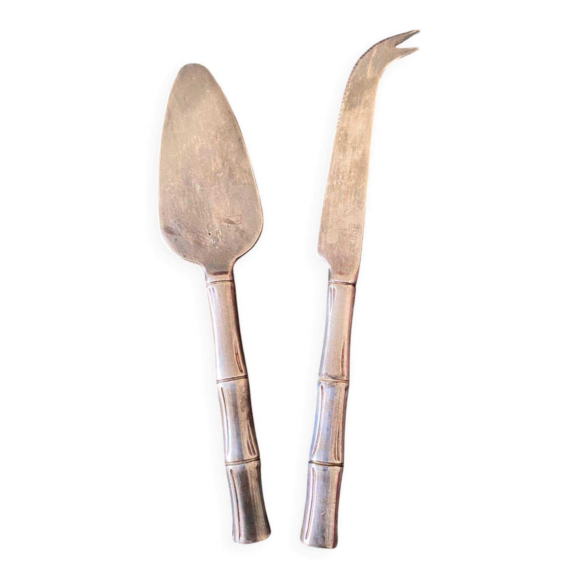 Cheese cutlery with silver-plated bamboo handle.