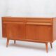 1950s cherry wood sideboard with sliding doors.
