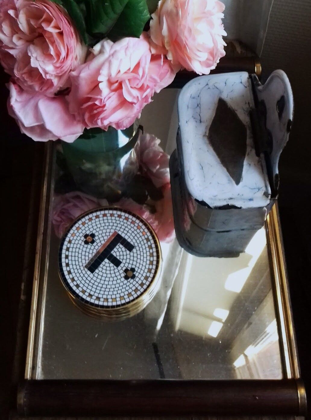 Rectangular mirror tray with wooden handles and gilding.