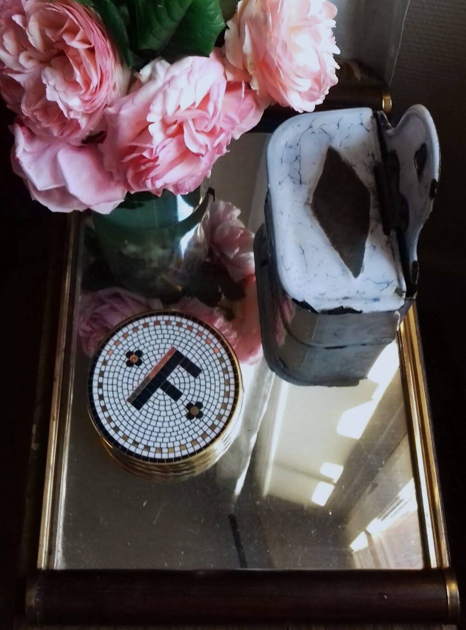 Rectangular mirror tray with wooden handles and gilding.