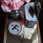 Rectangular mirror tray with wooden handles and gilding.