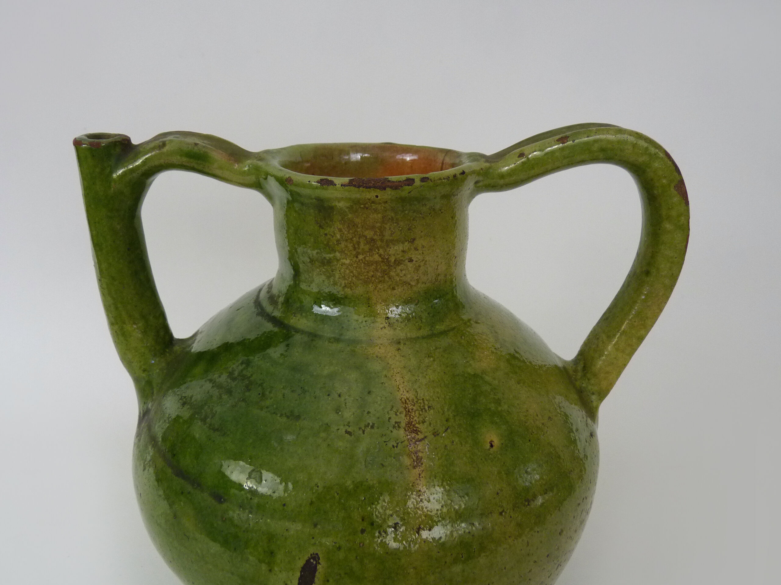 Pitcher pottery in green glazed terracotta, south west of France. XIXth