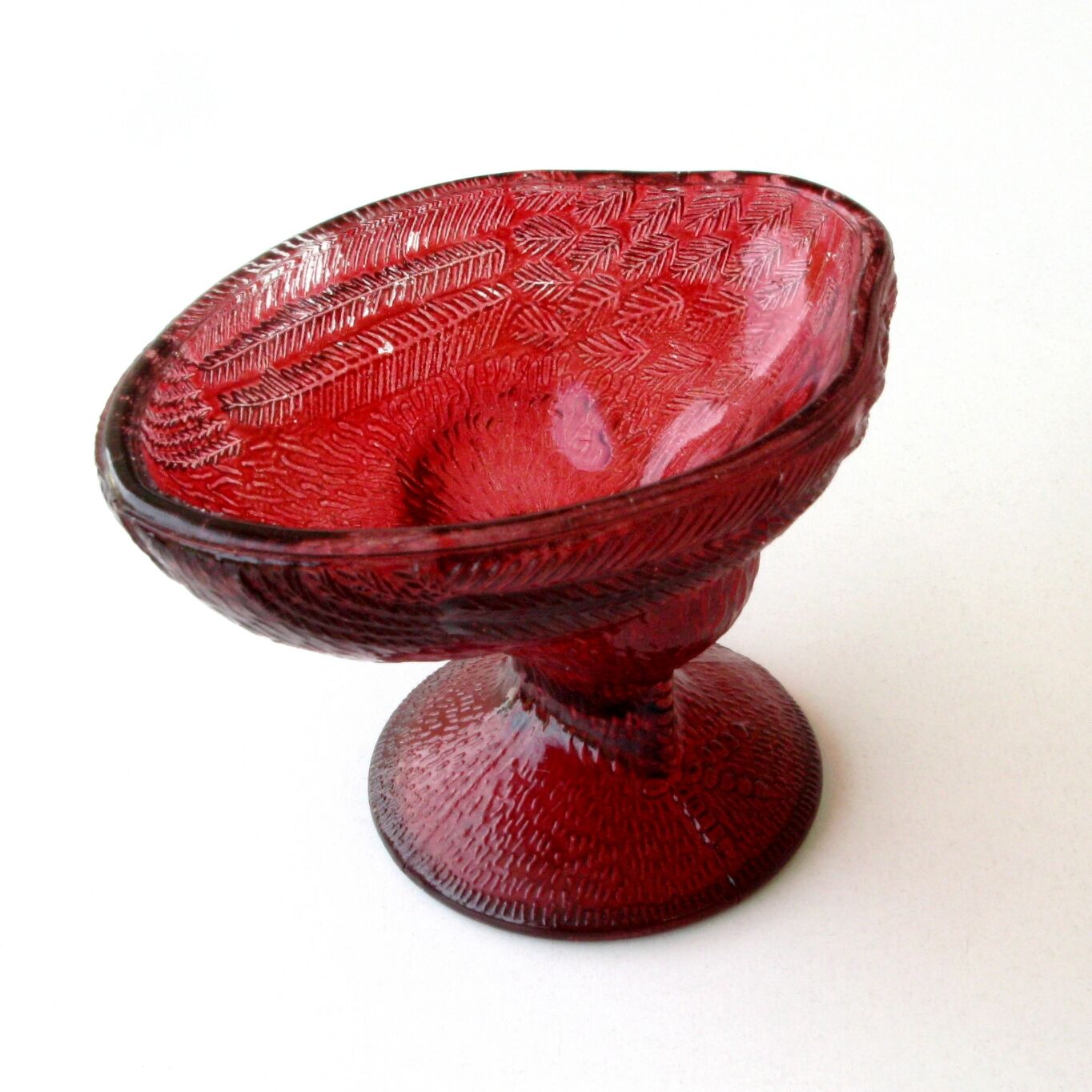 Old candy or sugar maker in red glass