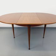 Round dining table in vintage Scandinavian style from the 50s and 60s in teak.