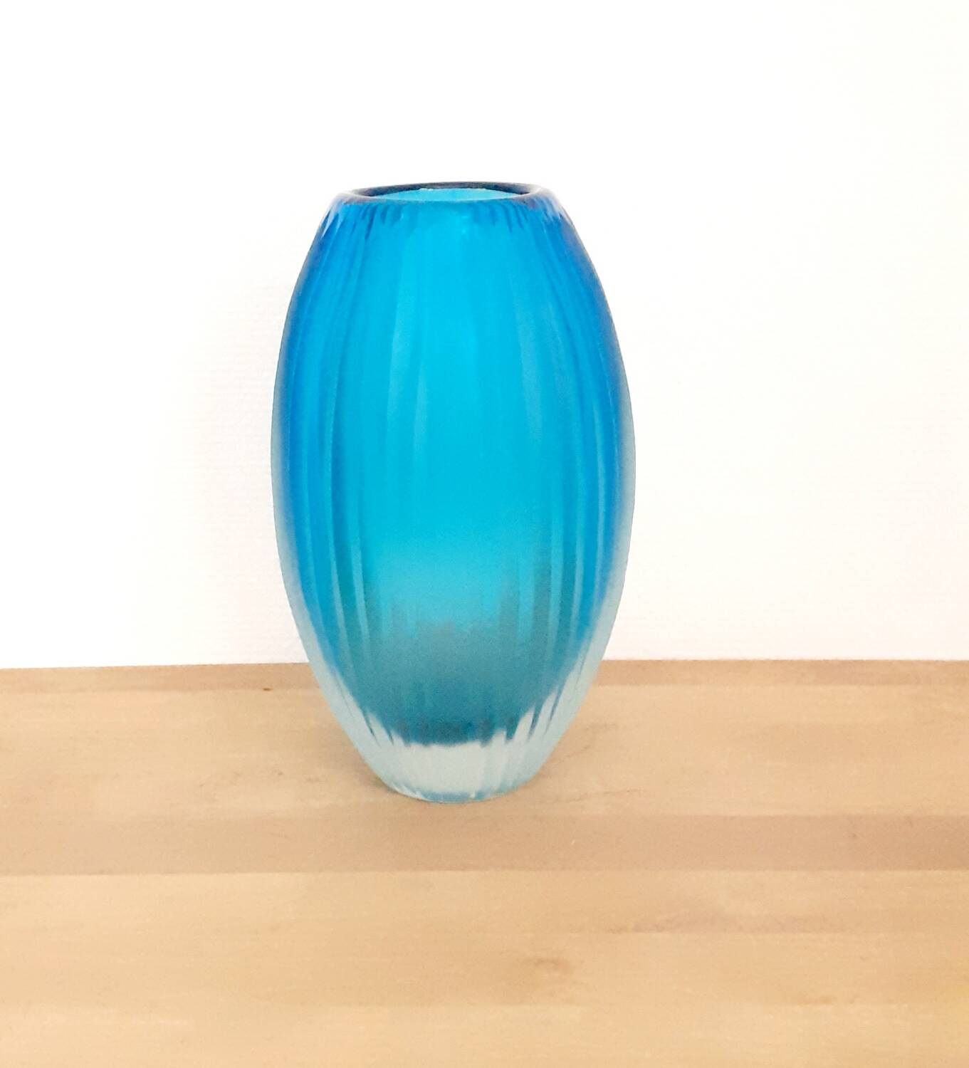 Antique turquoise glass vase