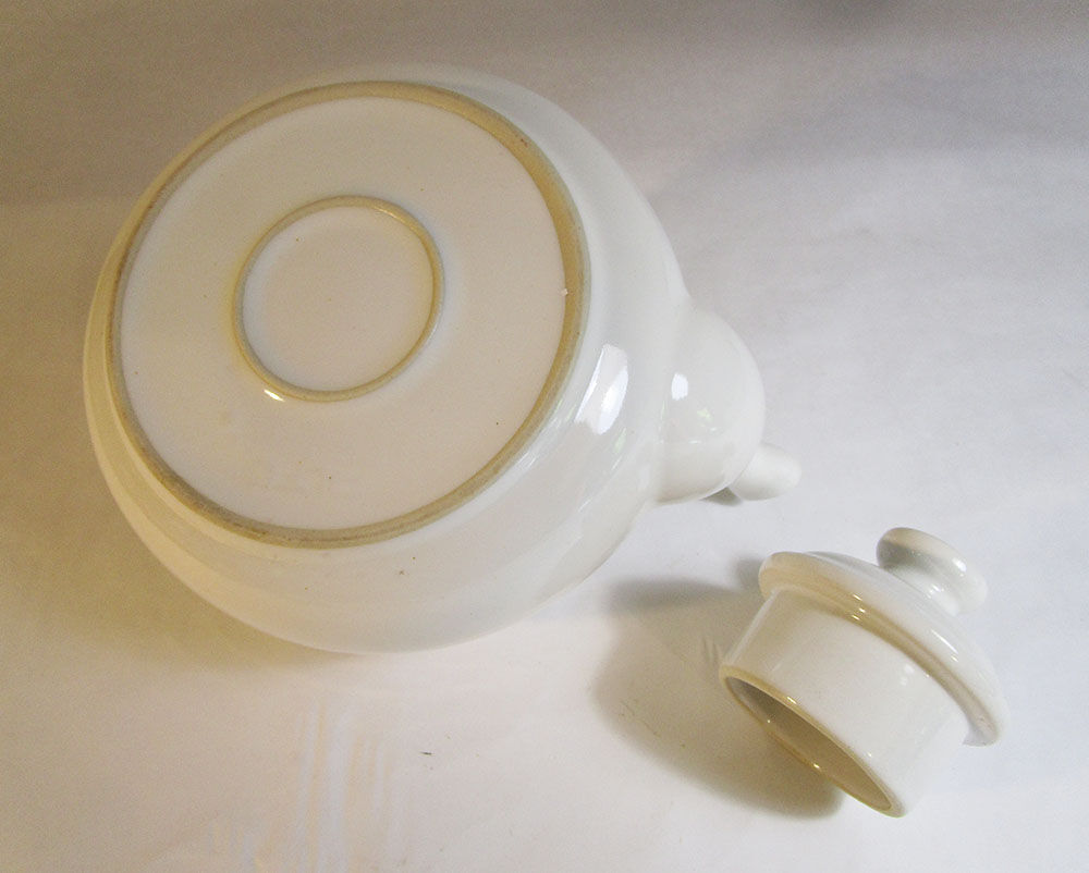 Large white ceramic teapot