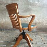 Antique office chair oak adjustable with green leather