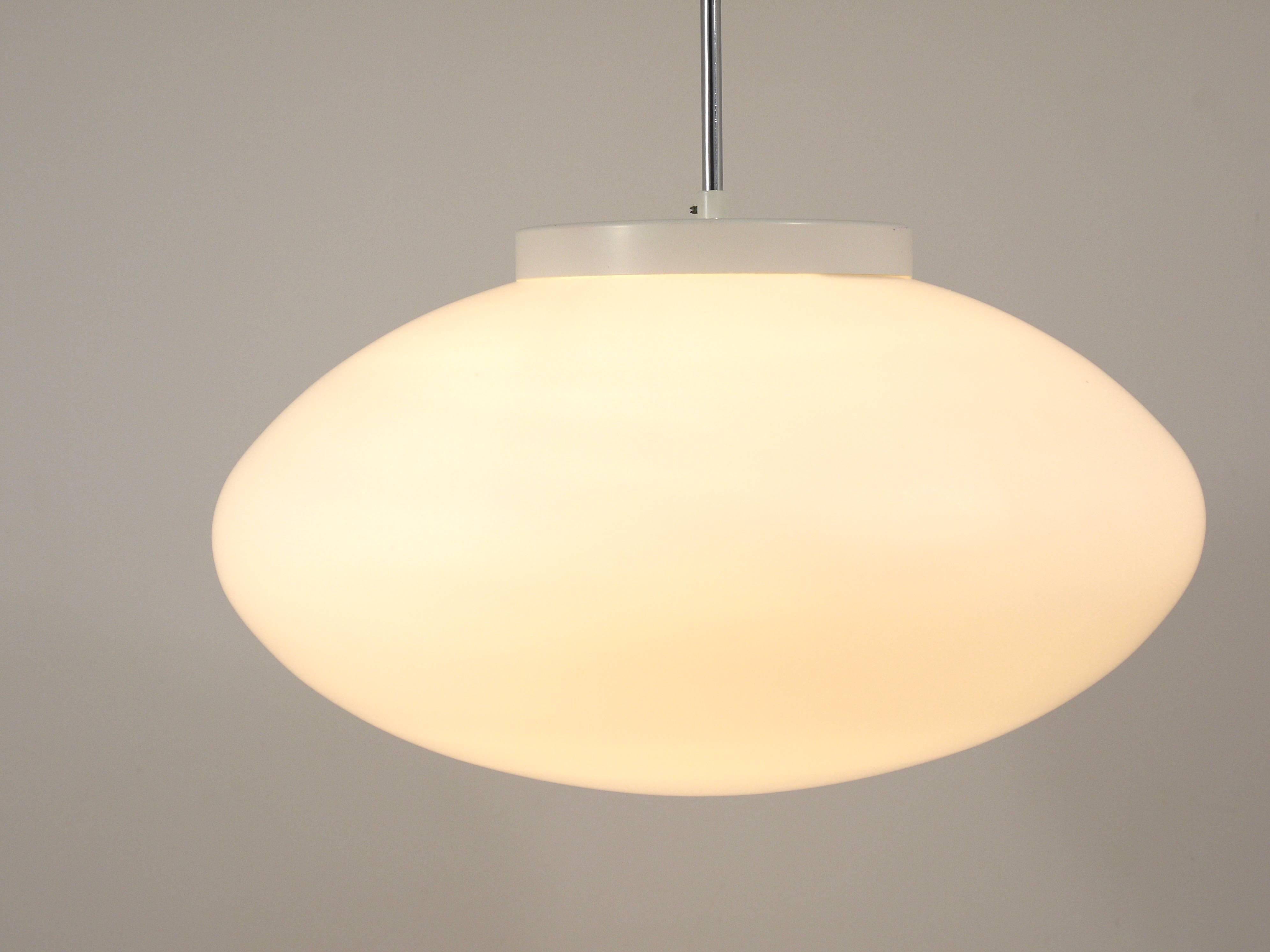 Up to 40 huge elliptical opaline glass pendants, in the style of Lisa Johansson-Pape.