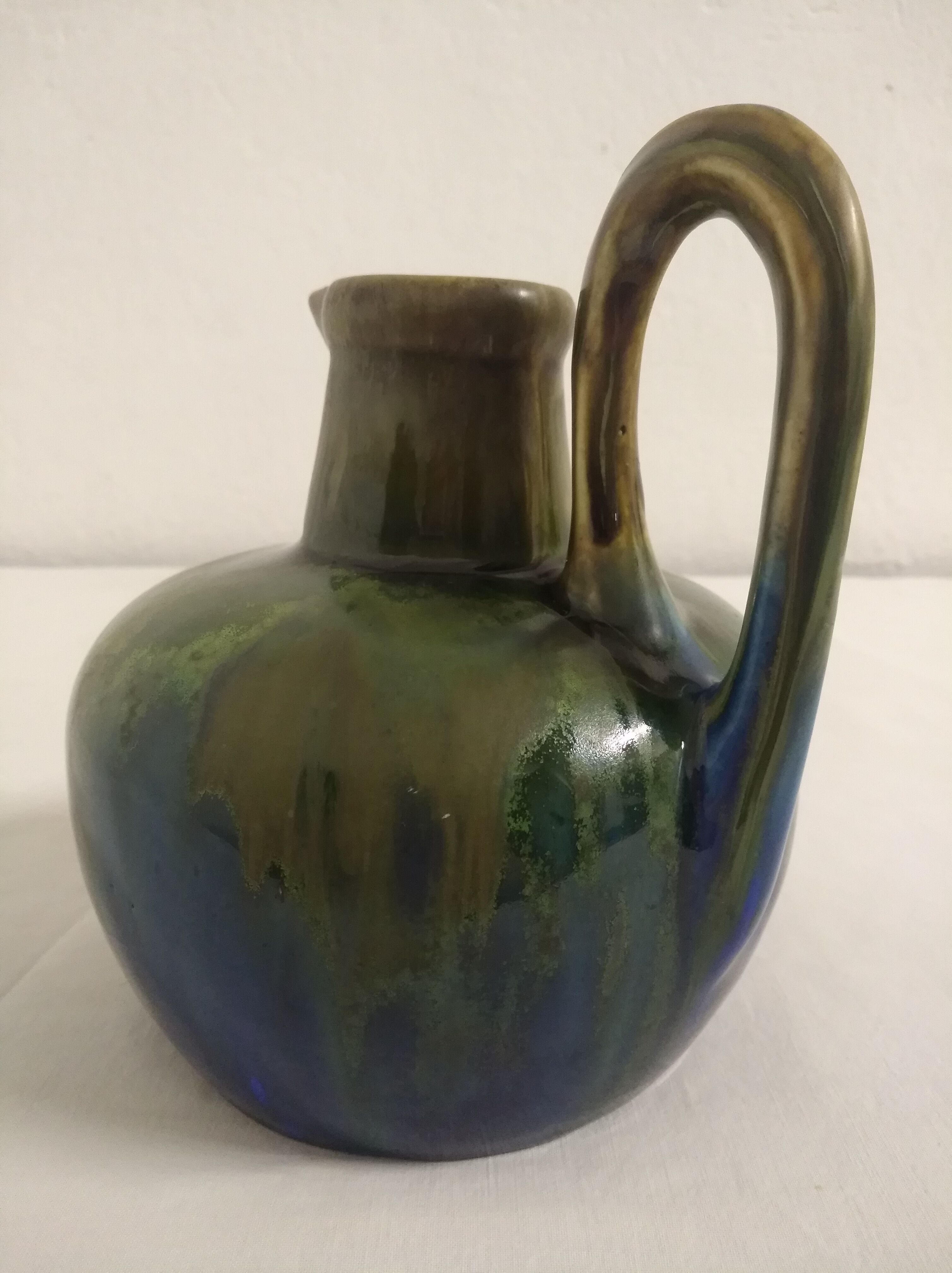 Flamed ceramic pitcher