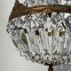 Balloon chandelier with glass crystal and brass tassels in empire style