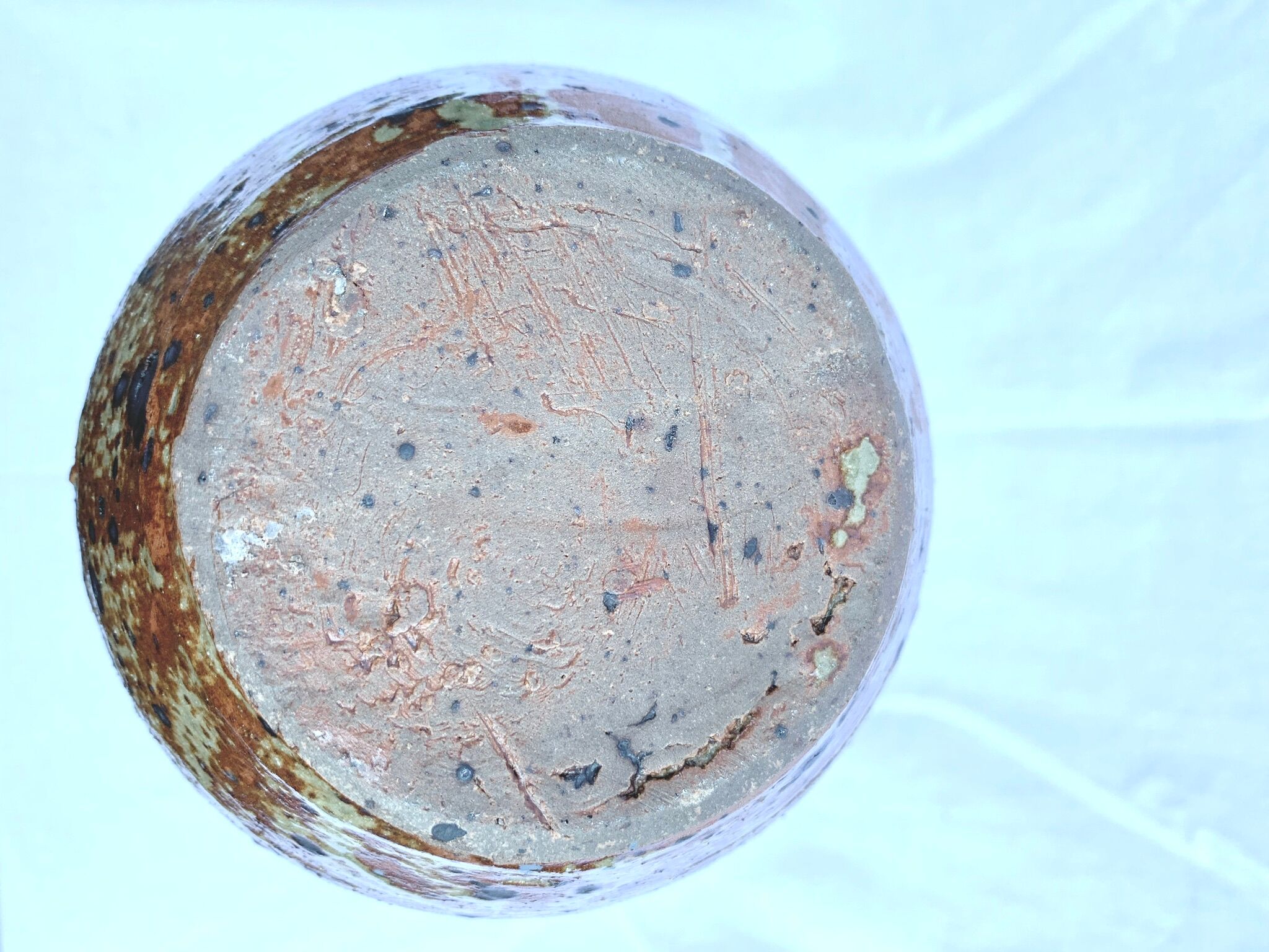 Speckled enamelled sandstone pitcher