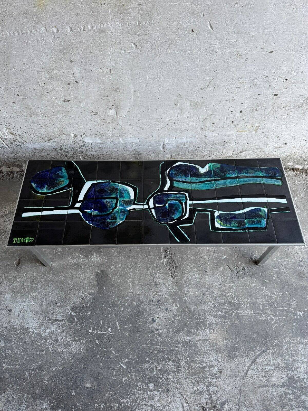 Mid-century Denisco ceramic coffee table — black, blue and white glazed tile top with silver metal base