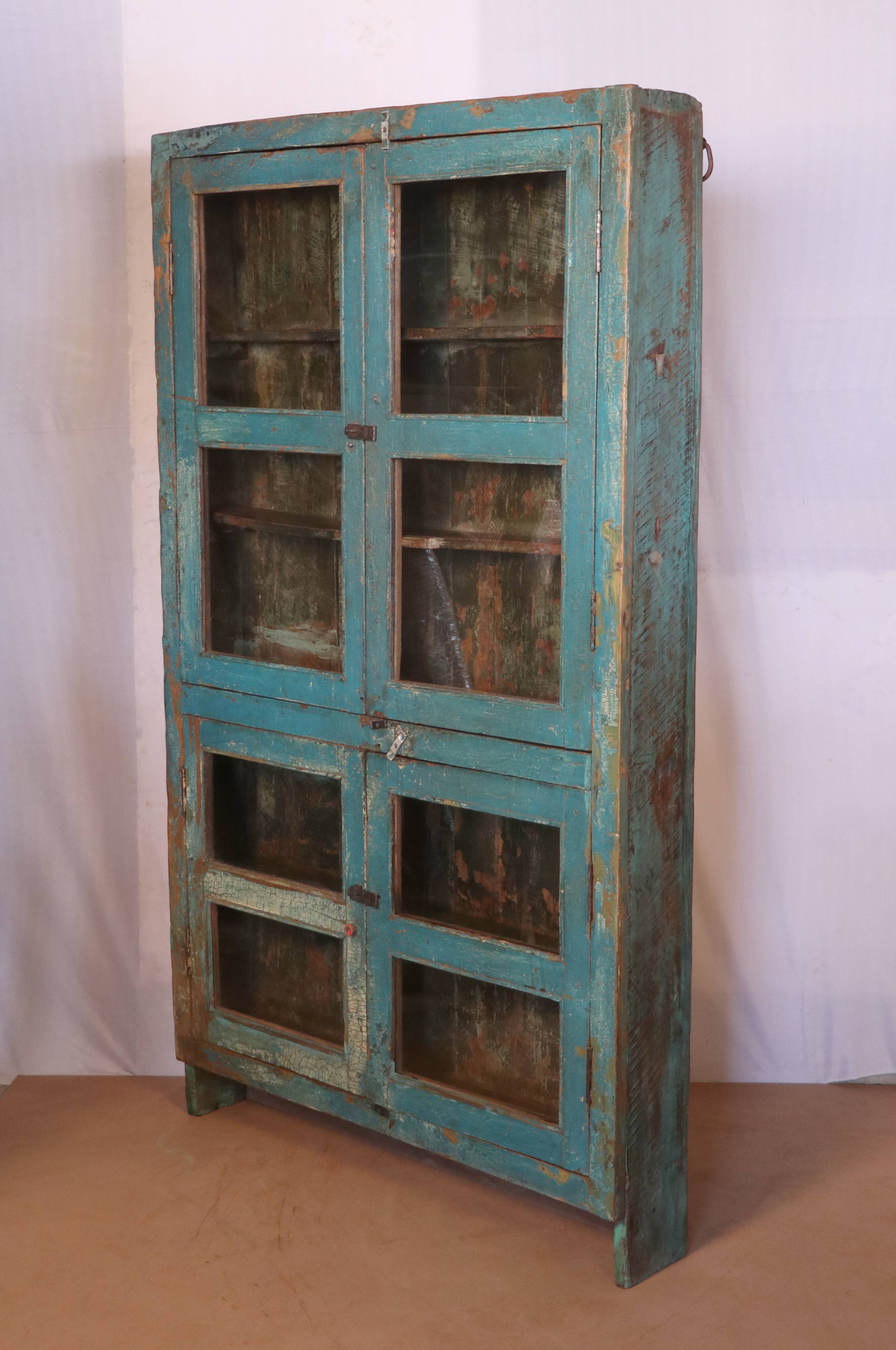 Old showcase in original blue patina Burmese teak