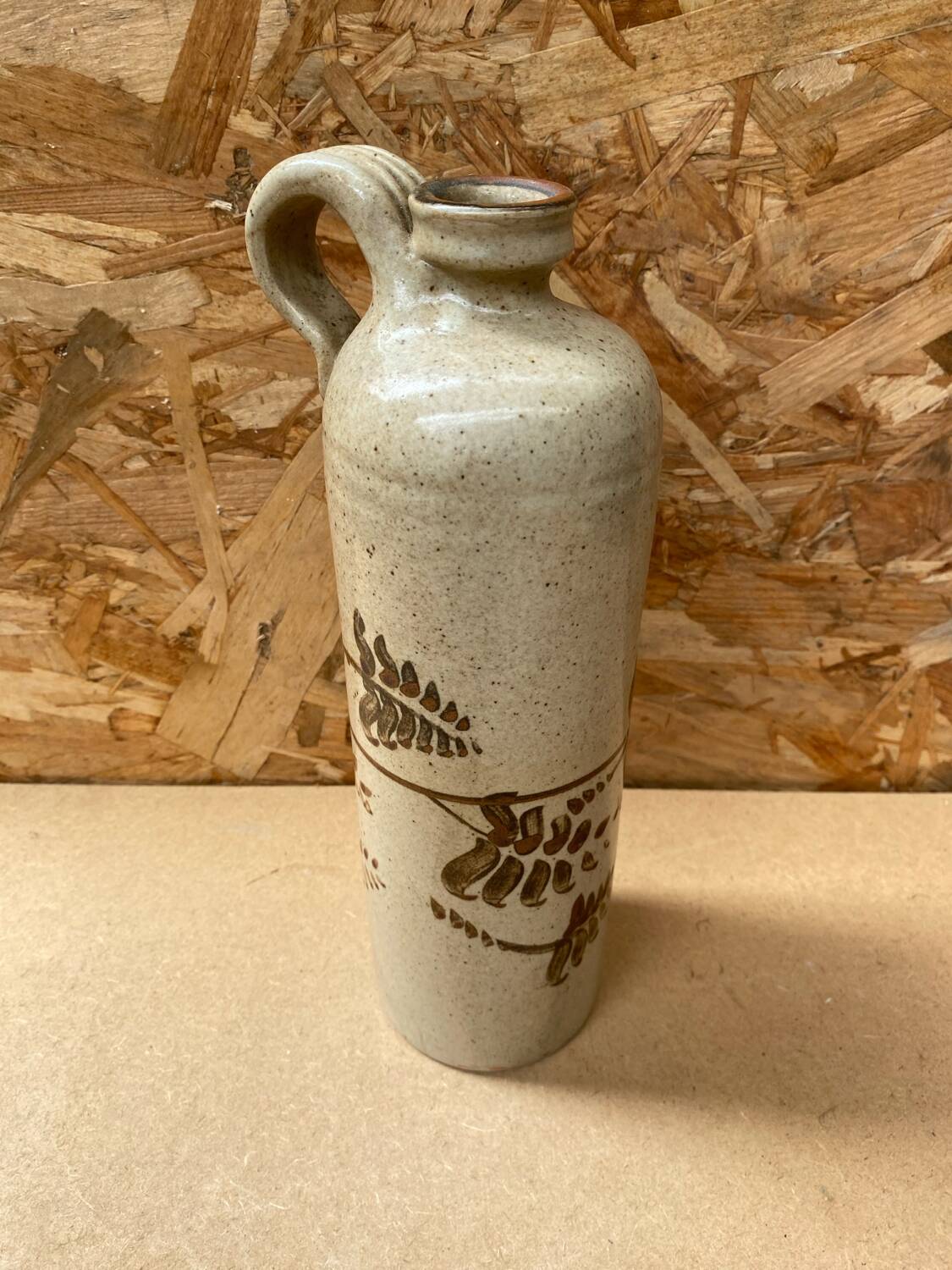 Antique beige enameled ceramic bottle vintage leaf decor