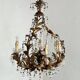 Chandelier with tassels and golden brass