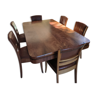 Solid walnut table from the 1930s, central leg and 6 studded leather chairs