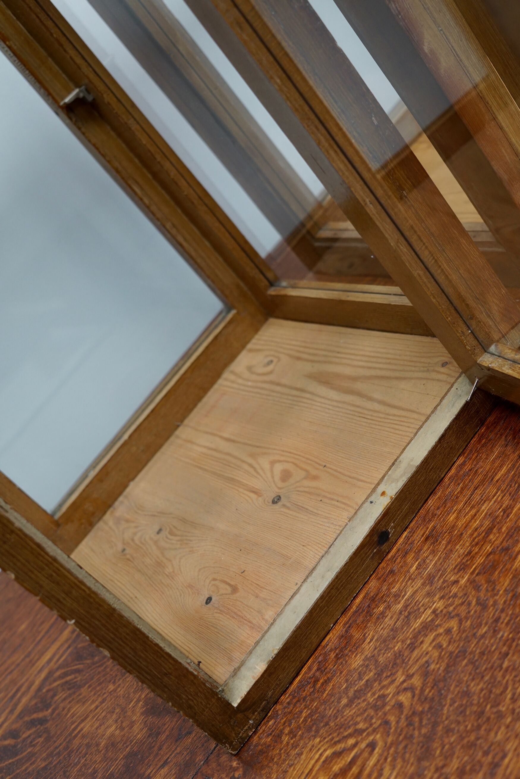 pair of faux oak shop display cabinets, circa 1920s