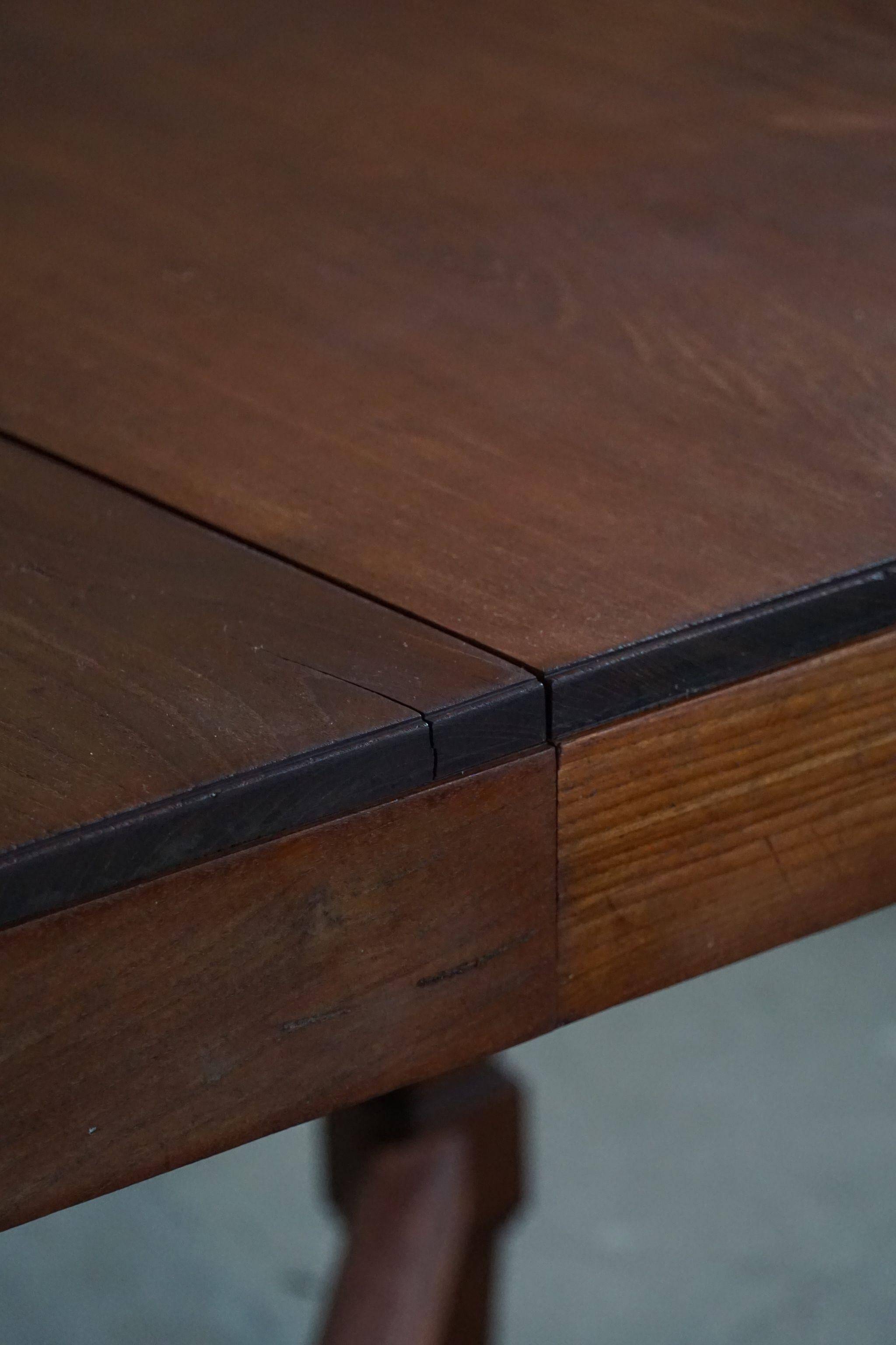Art Deco dining table in teak, with butterfly extension, Danish cabinetmaker, 1940s.