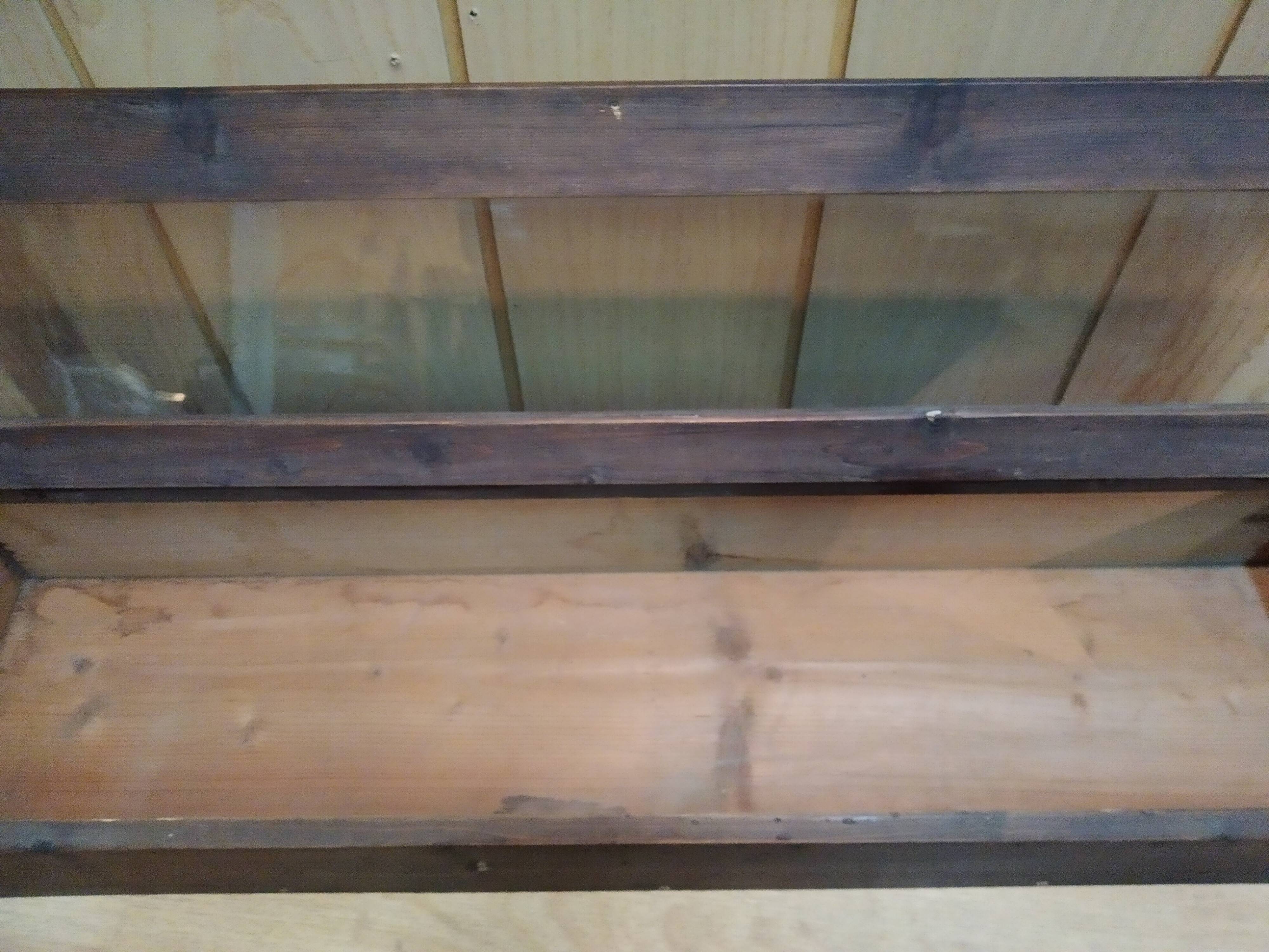 Former wooden display case