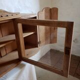 Art-deco wall showcase in raw oak