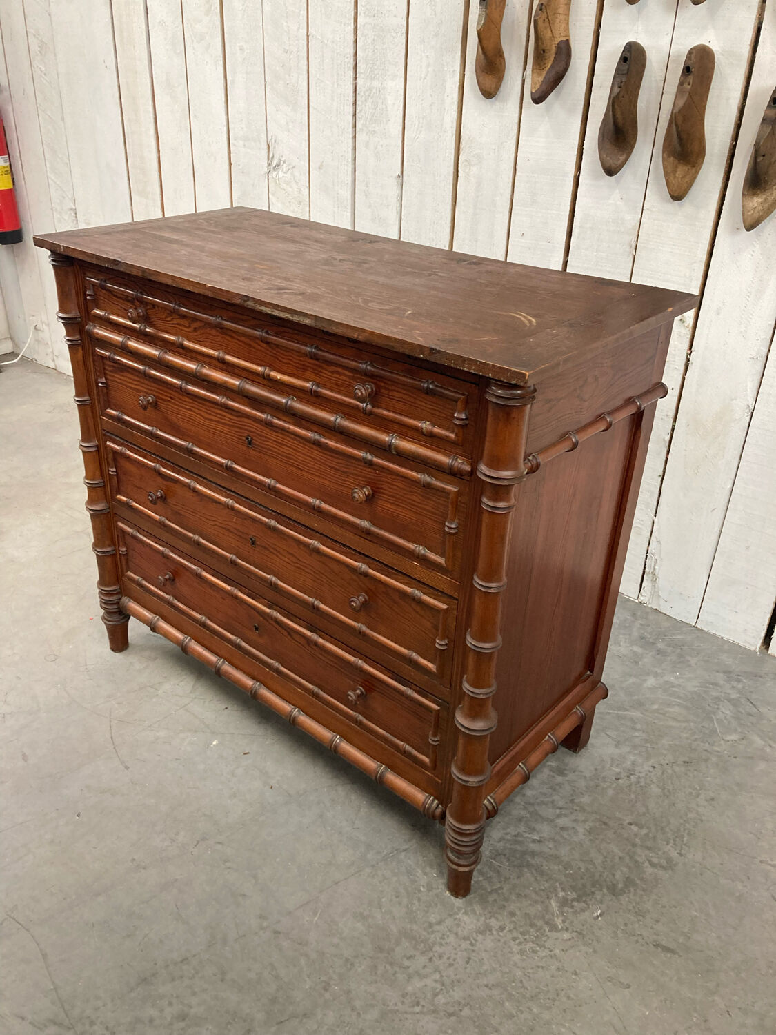 Old wooden chest of drawers imitation bamboo