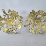 Pair of gilded bronze candlesticks with vine décor