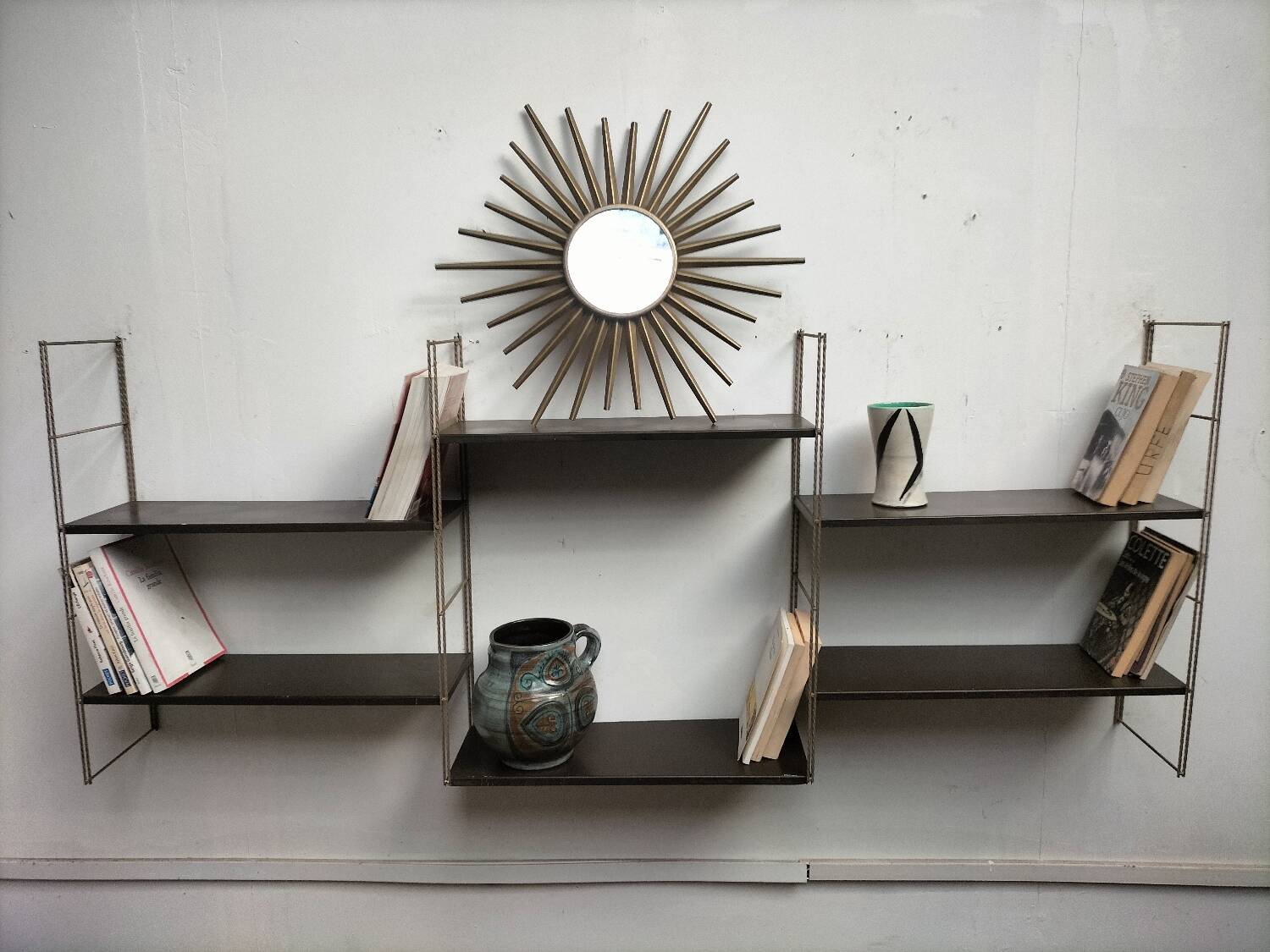 Metal string shelf