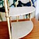 Corner wicker shelf