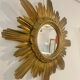 Miroir soleil doré